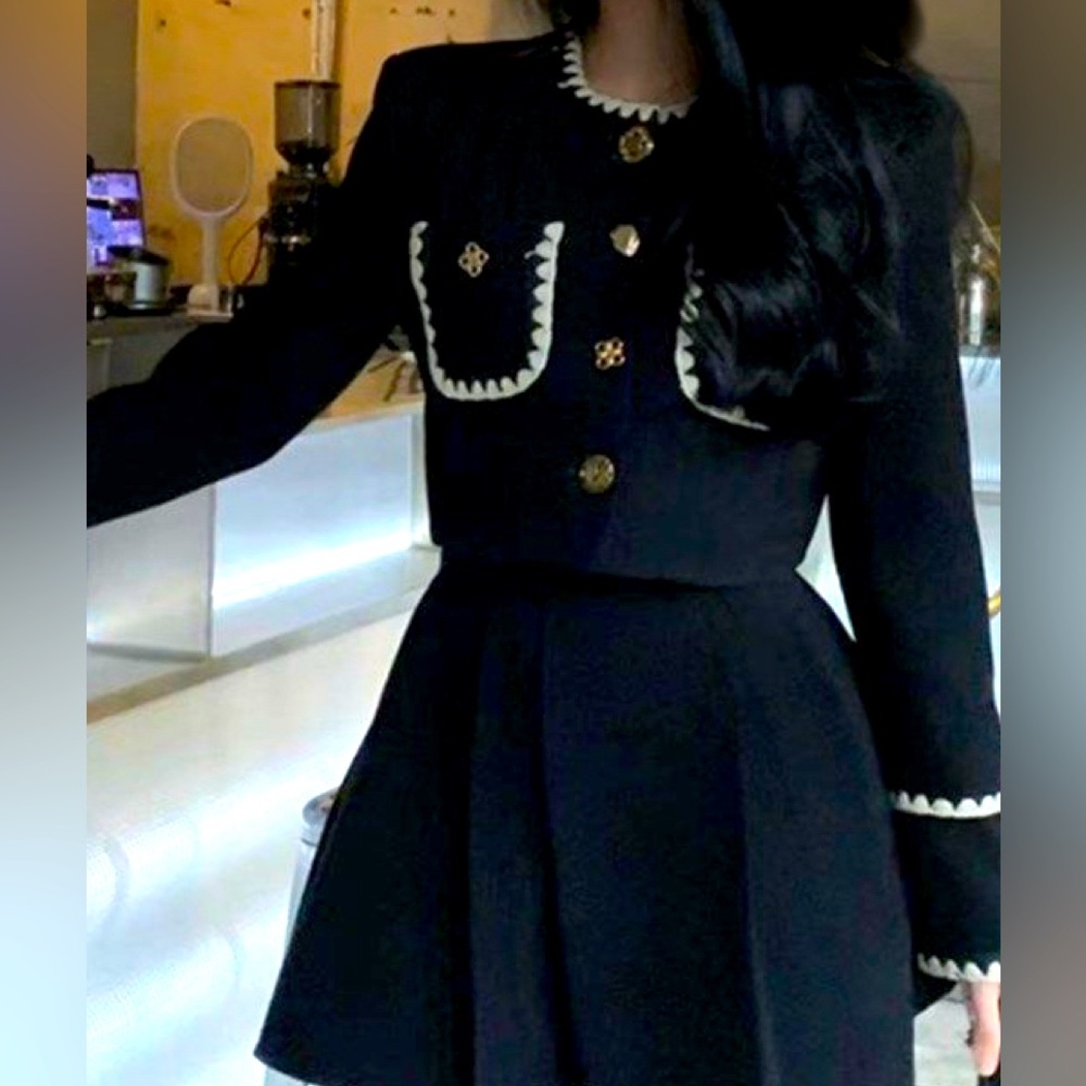 Elegant Black Skirt Set with Cream Trim